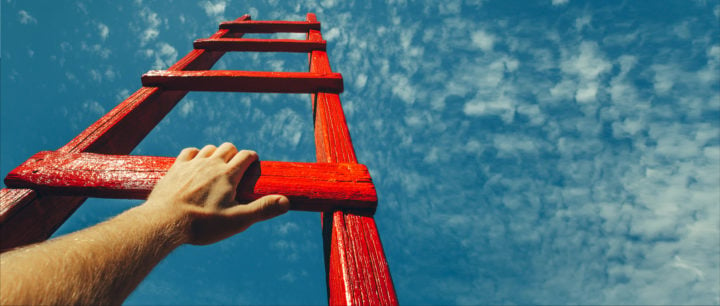 alt image text of man climbing a ladder to the sky