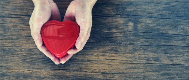 alt image text of hands holding a heart shaped item to signify physical and mental health