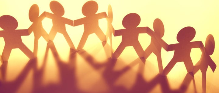 alt image text of paper chain of people to represent relationships