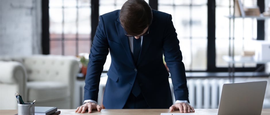 image of unsuccessful businessman feeling stressed after failure 