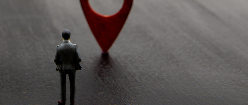 Salesman stands in front of red pain point of their client