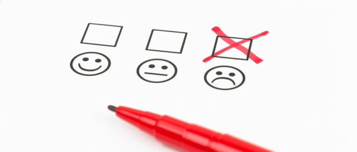 alt text image of three checkboxes with a happy face, a neutral face, and a sad face with the sad face checked representing making a bad decision