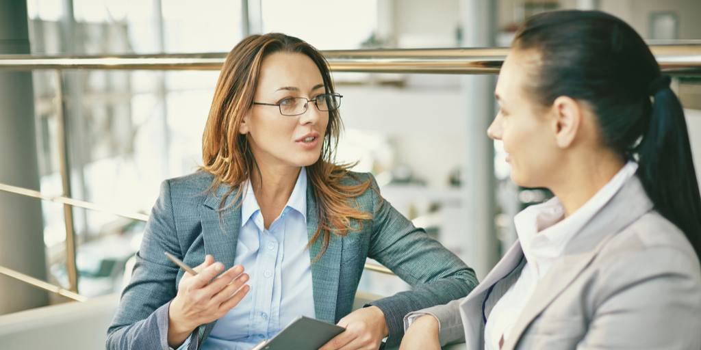 two businesswomen in a conversation