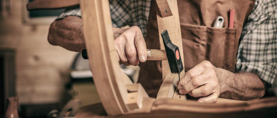 craftsman building high quality furniture