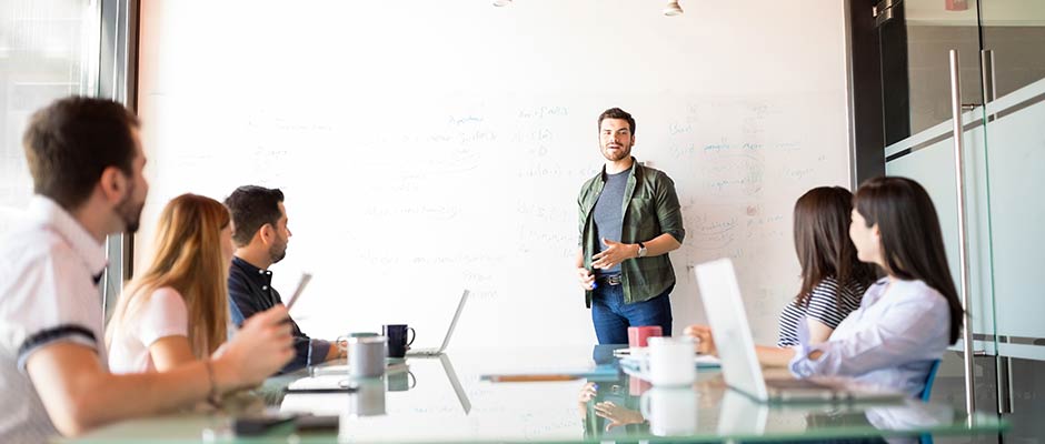 salesman pitching a client team