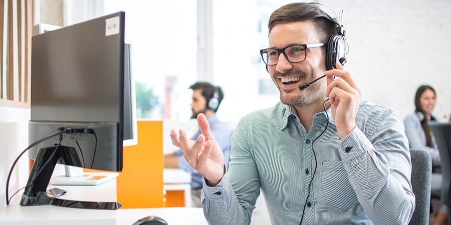 Salesperson smiling on a cold call