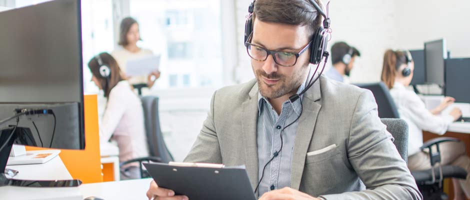 man with sales script on a call