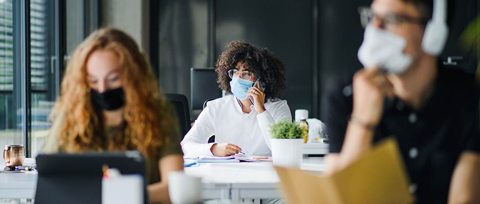 office workers wearing masks