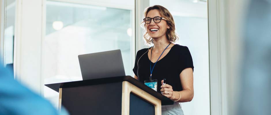 woman at presentation lecturn