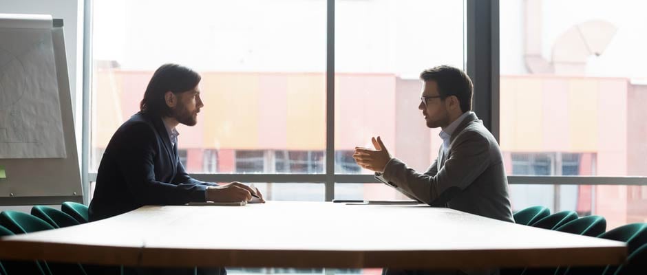 salesman explaining a deal to a client