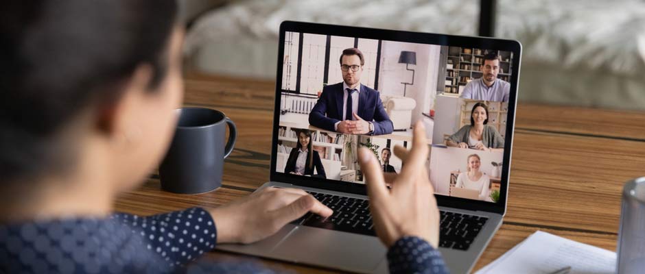 woman having a virtual meeting on a laptop