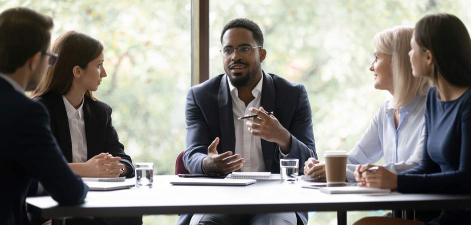 african american man in sales meeting