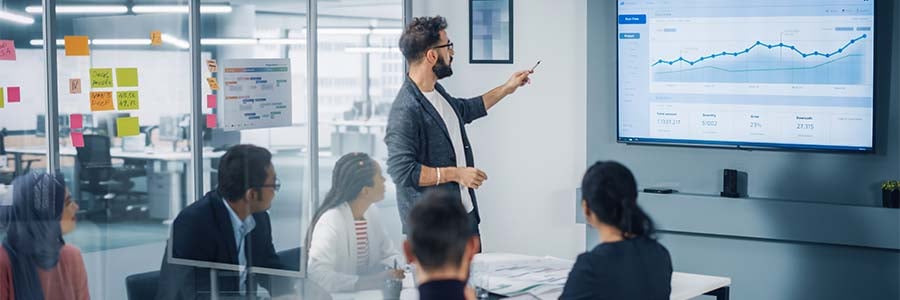 salesman leading a boardroom meeting