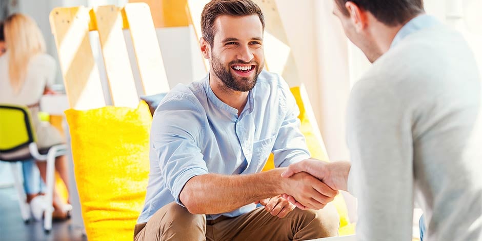 Smiling businessman sharking hands