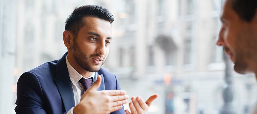 salesman discussing value on a cold call