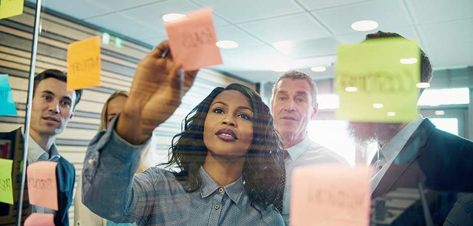 Business woman planning with sticky notes