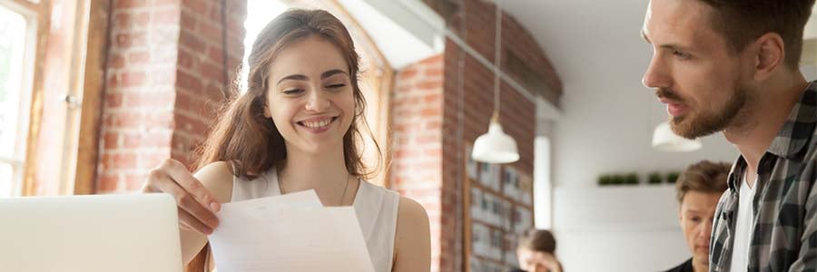 Client reviewing documents from salesman