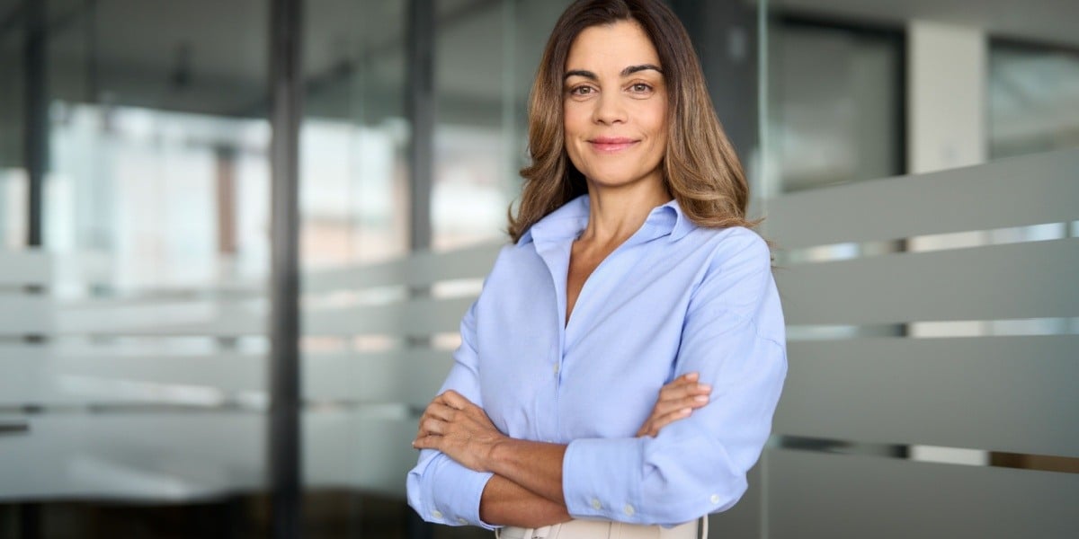 Businesswoman standing confidently with arms crossed