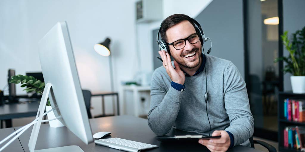 Smiling man on a sales call
