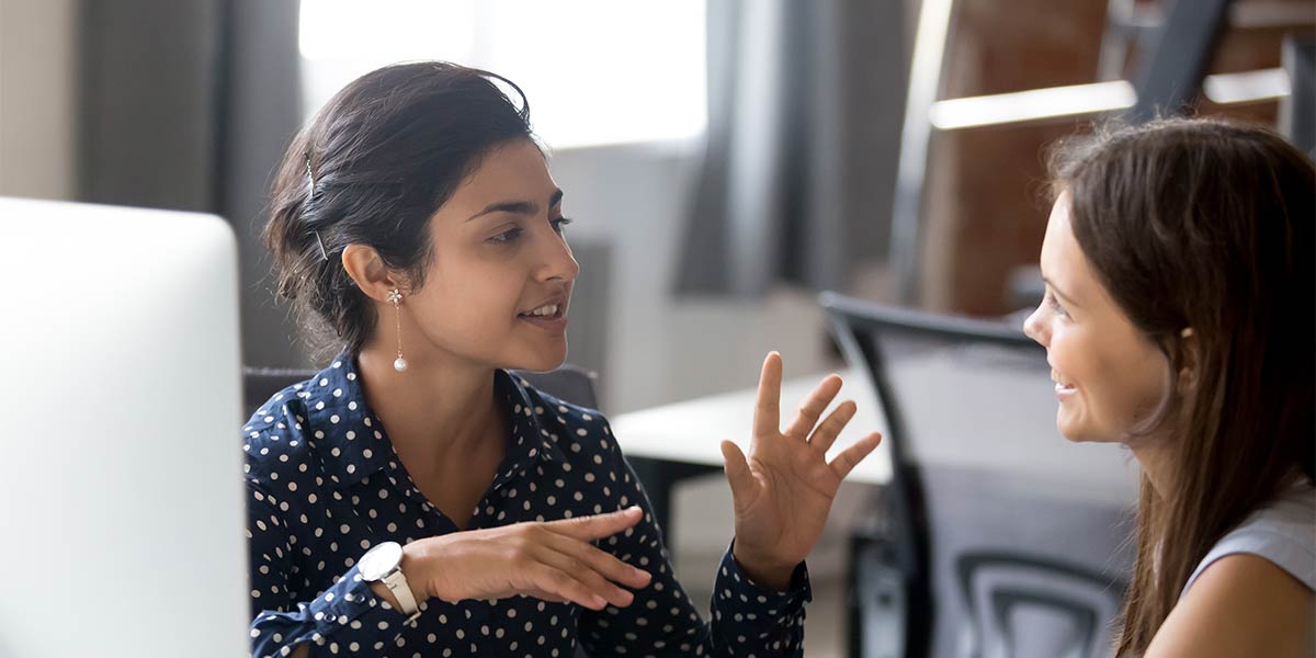 Female manager talking to new employee