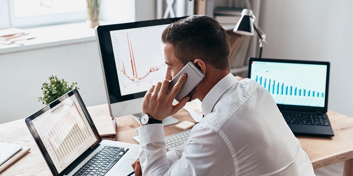 Businessman at desk on the phone