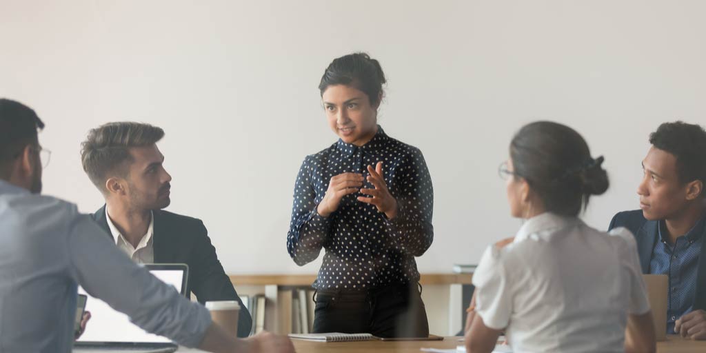 Sales leader coaching her team
