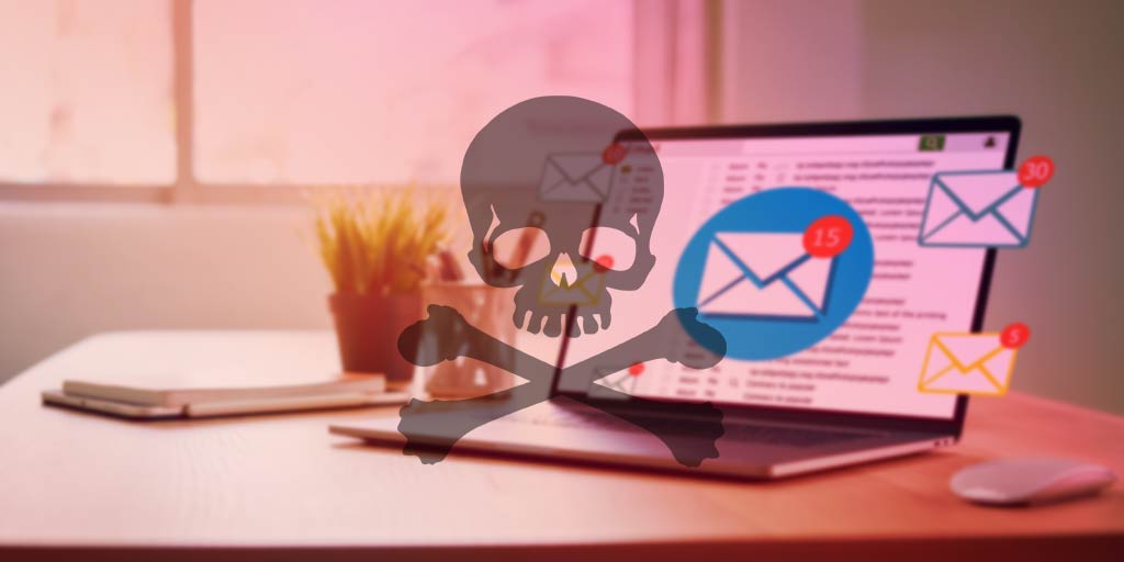email on computer with skull and crossbones overlay
