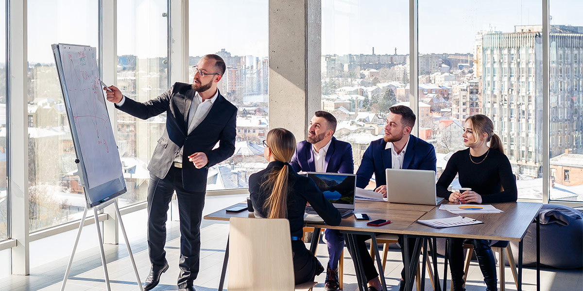 Sales manager coaching his team