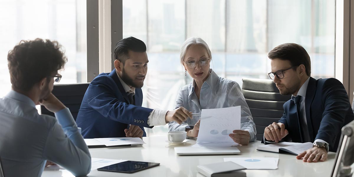 Group of executives in a sales meeting