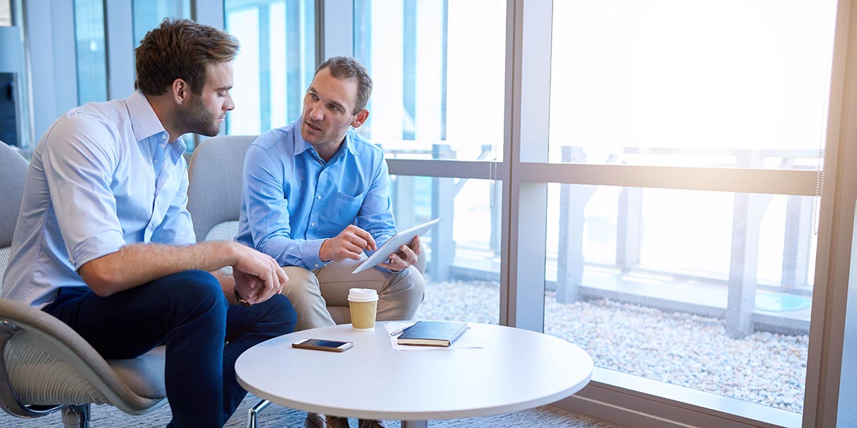 two businessmen engaged in conversation
