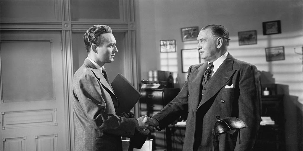 vintage businessmen shaking hands